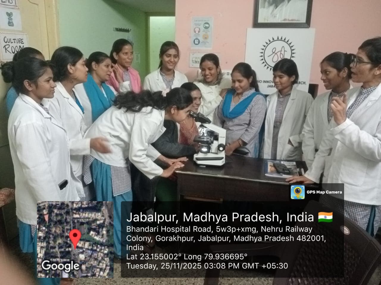 Students observing microscopic samples in a modern lab