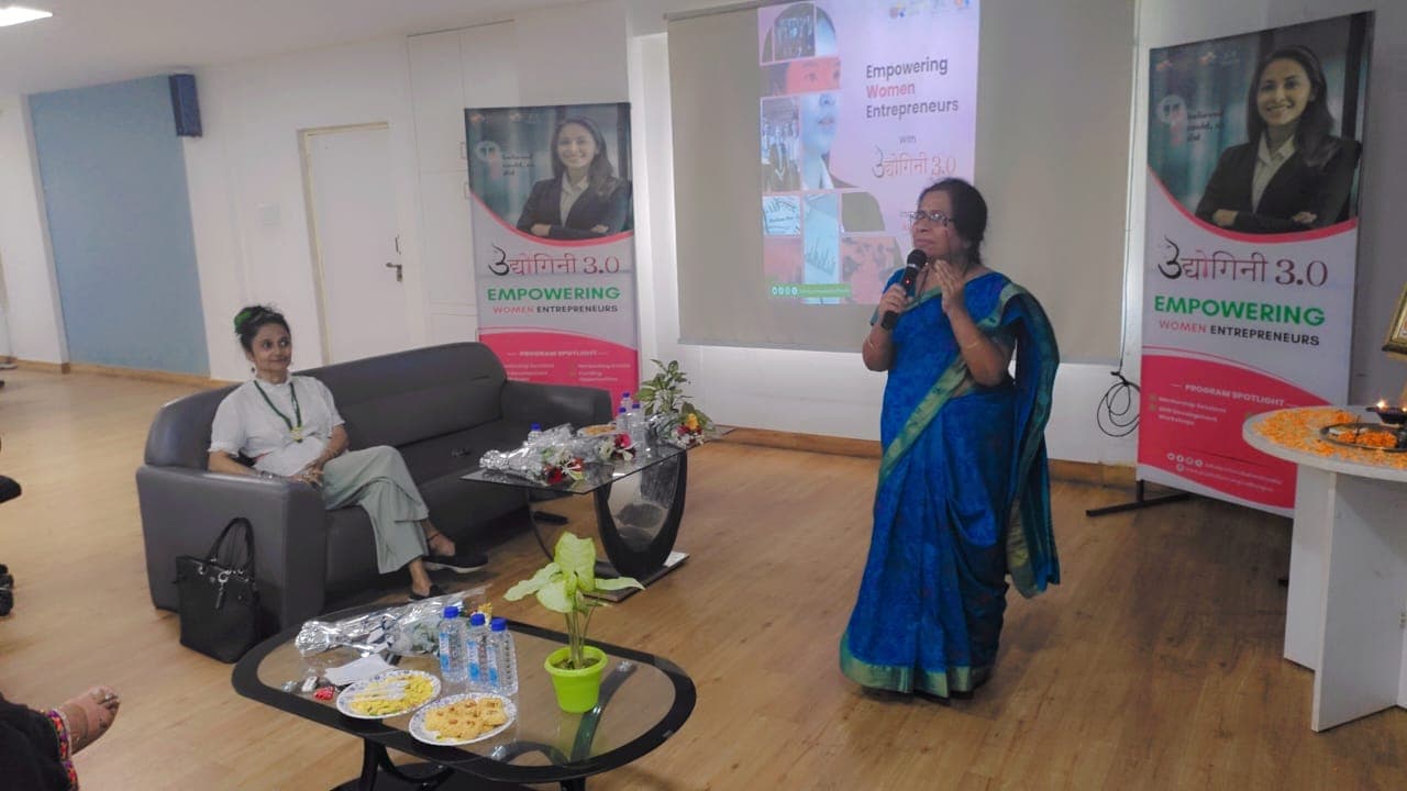 Lead scientist giving a presentation in a conference hall